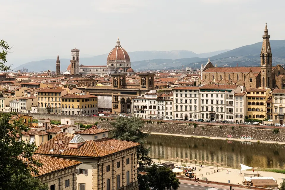 Florence's rooftops and the Duomo seen from Piazzale Michelangelo, with the Arno below
