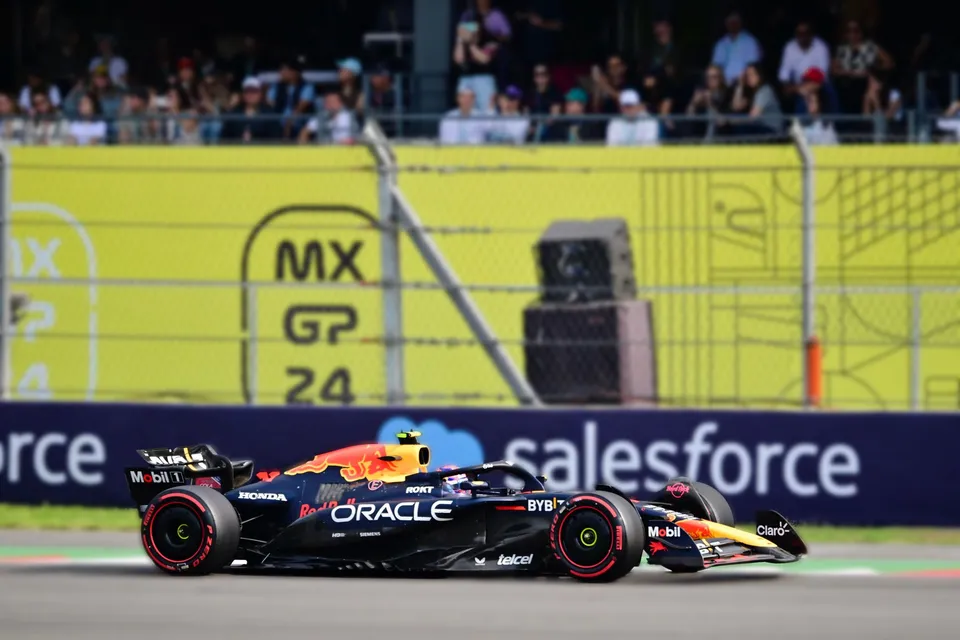 A Red Bull Formula 1 car passing the stands at the 2024 Mexico City Grand Prix